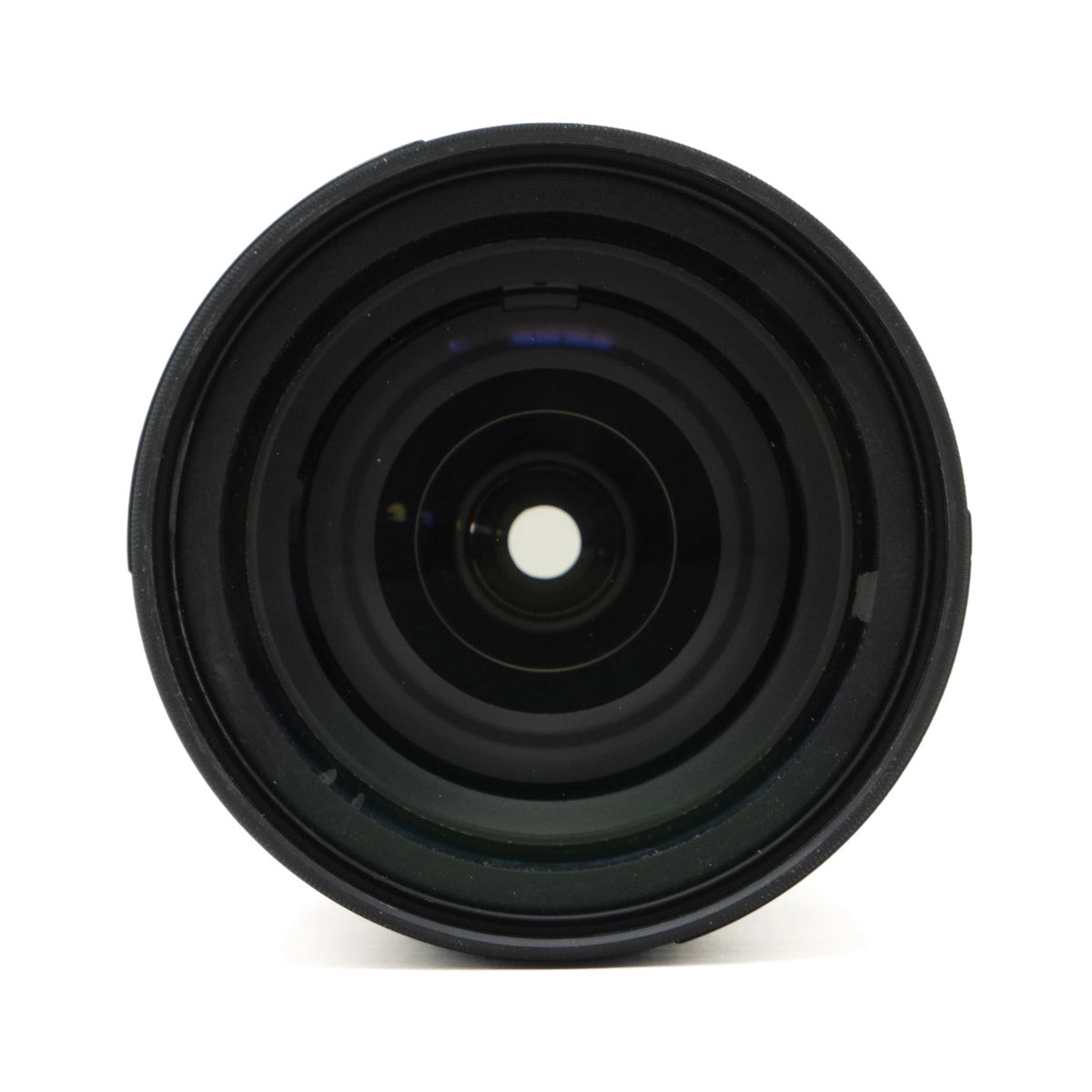 Black camera lens on a white background