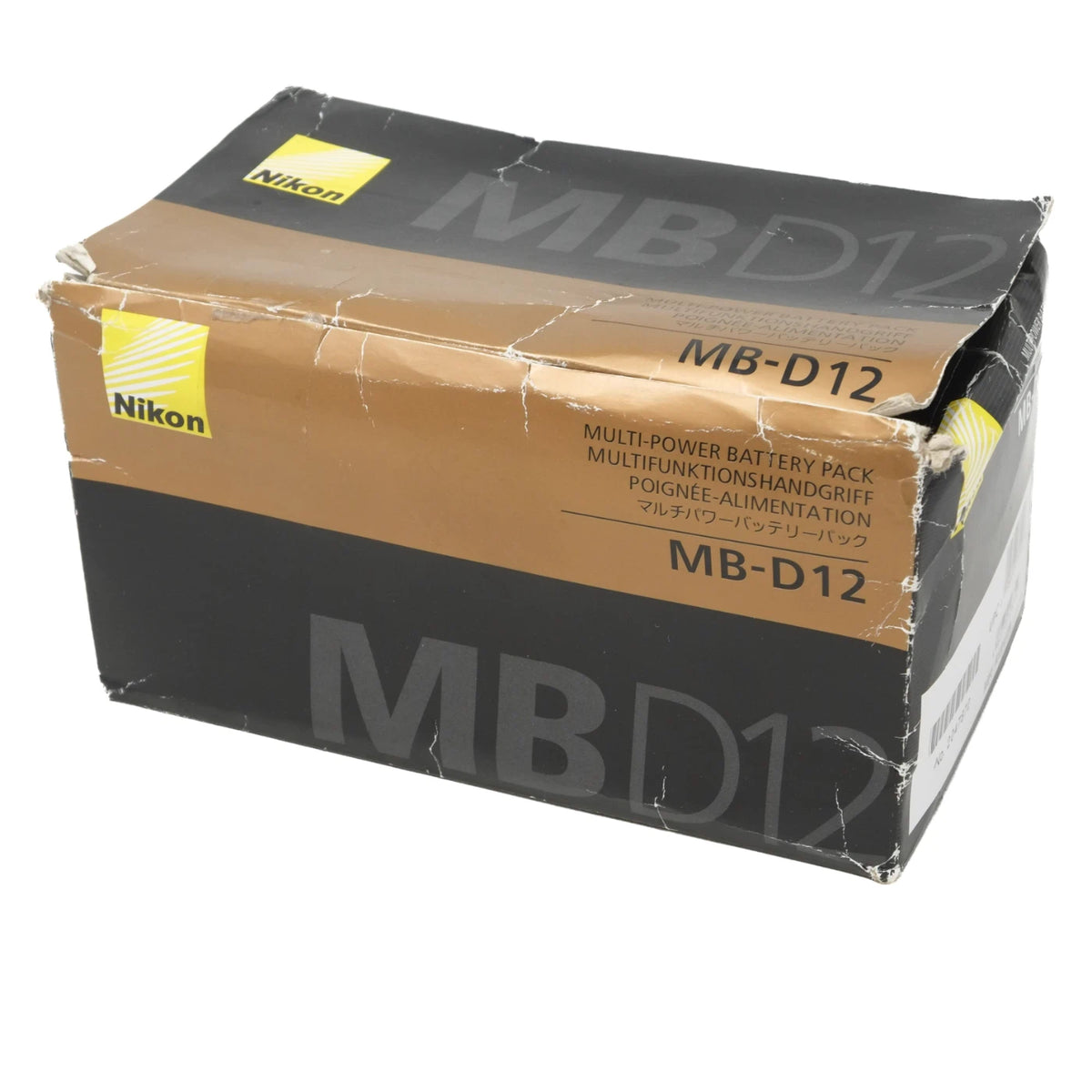 Nikon MB-D12 multi-power battery pack retail box, showing the black and brown packaging with the Nikon logo and MB-D12 model text on a white background.
