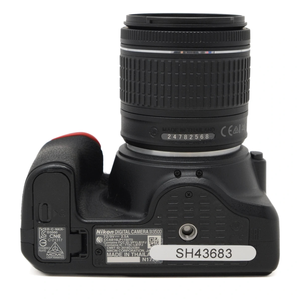 Nikon camera body with lens on a white background