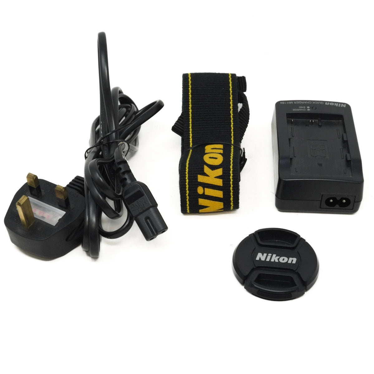 Collection of Nikon camera accessories including a charger, cable, strap, and lens cap on a white background.