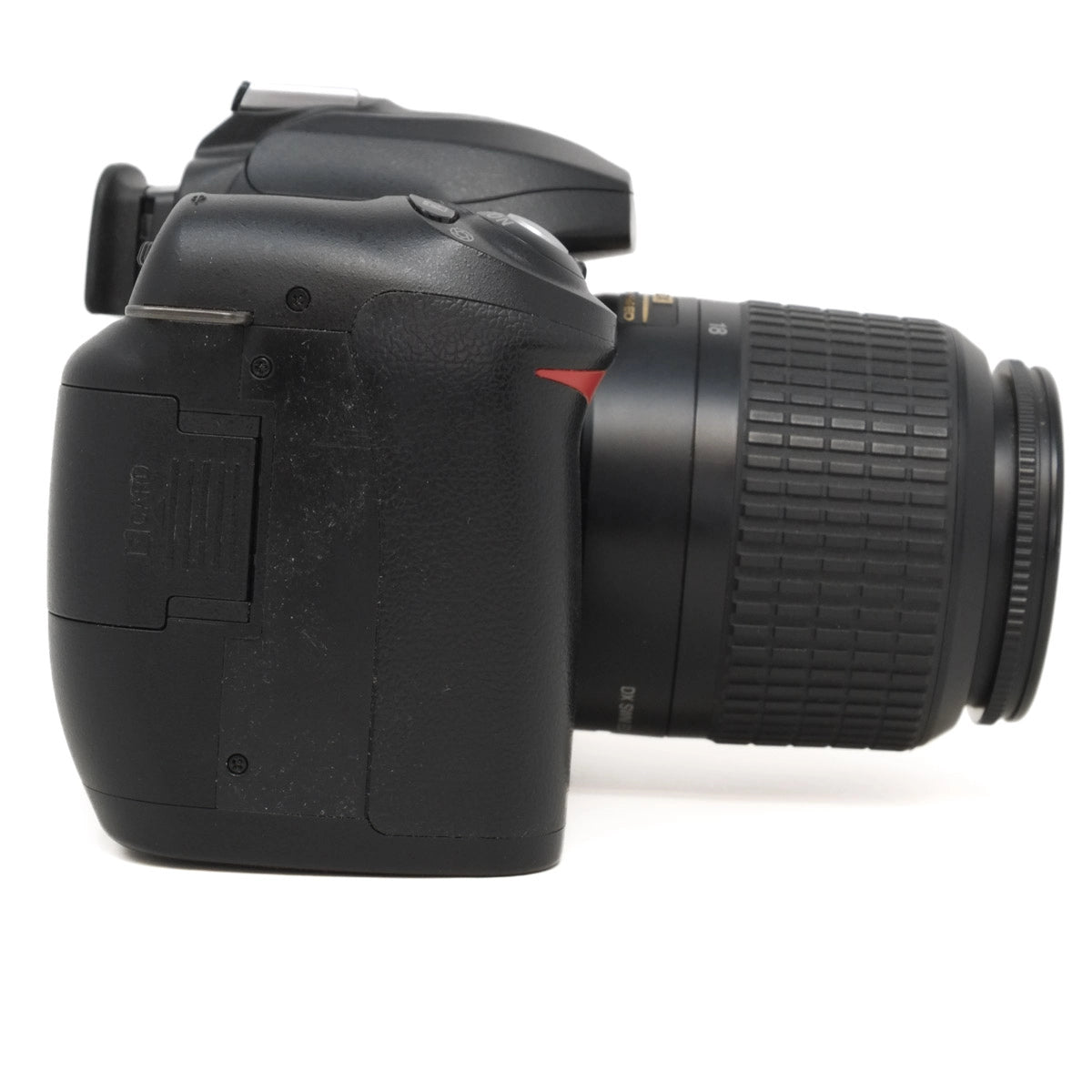 Black DSLR camera with lens on a white background