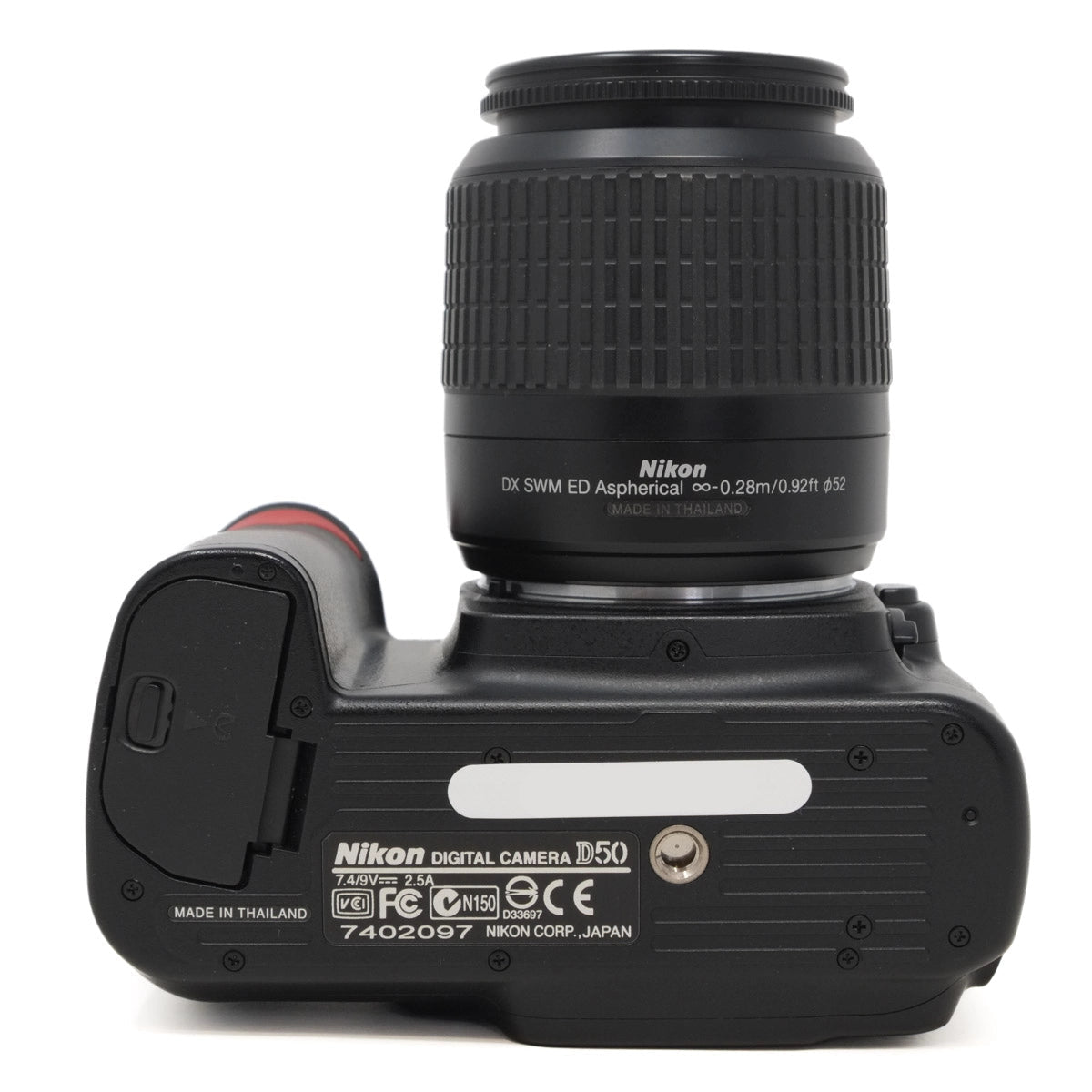 Nikon camera body with lens on a white background