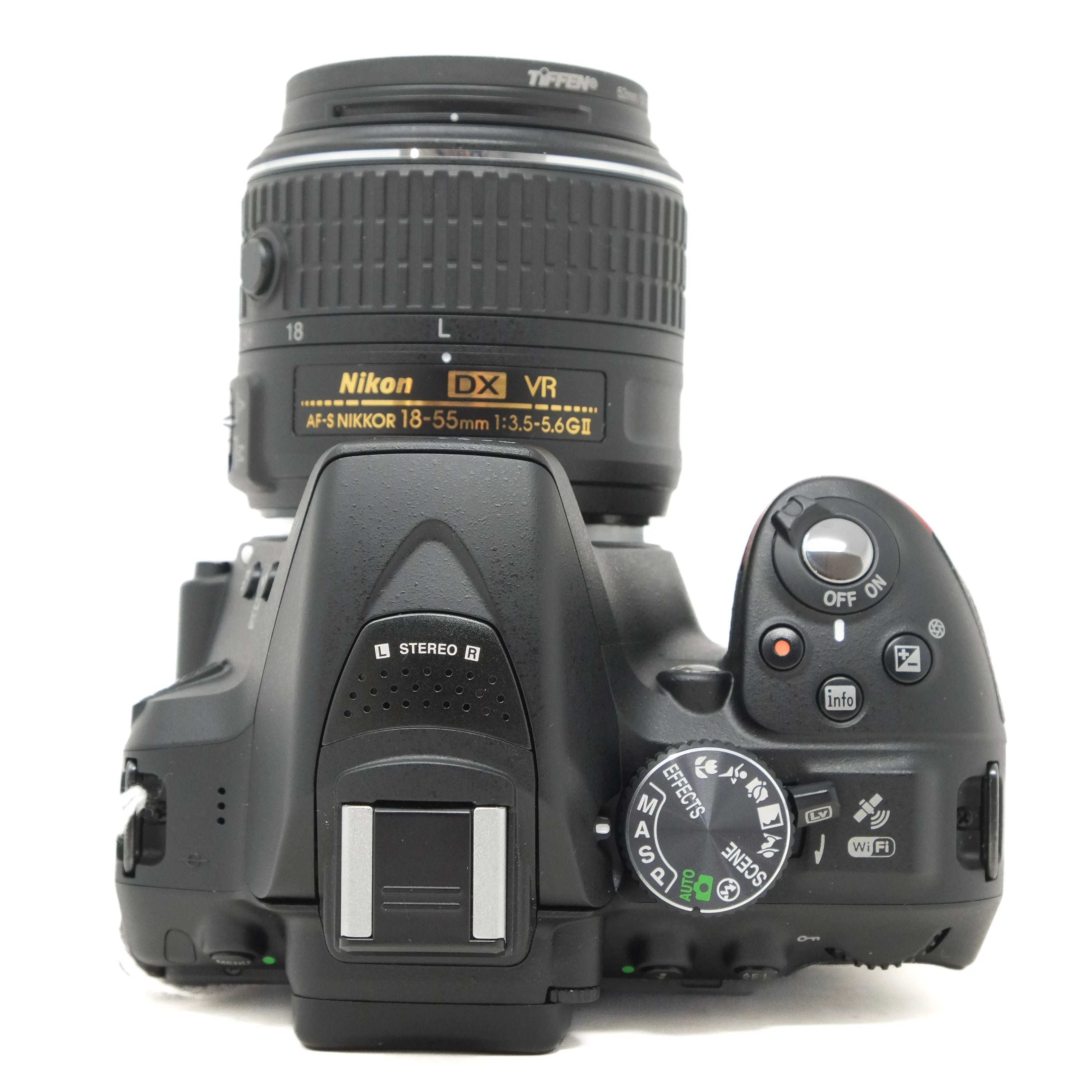 Nikon camera with lens on a white background