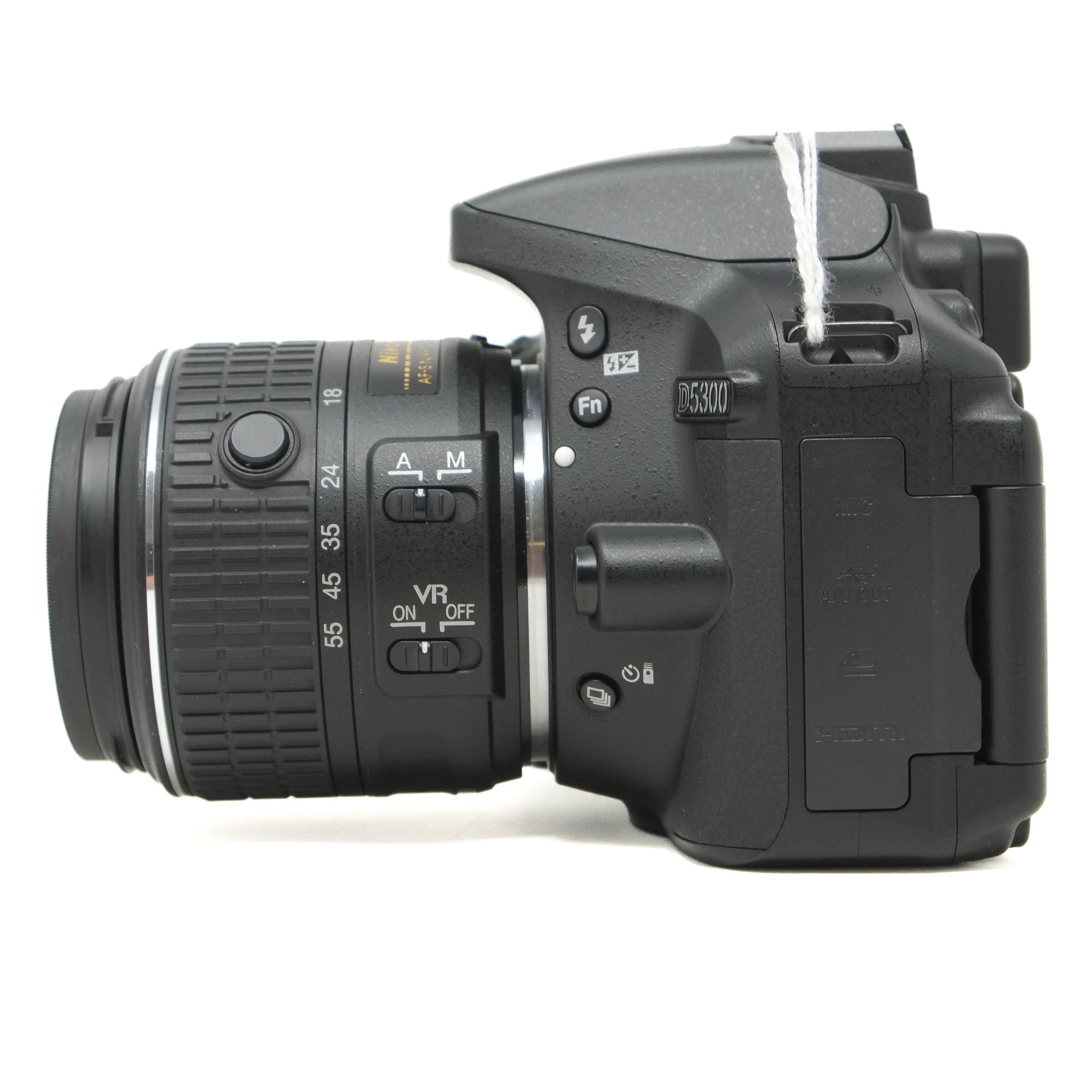 Black DSLR camera on a white background