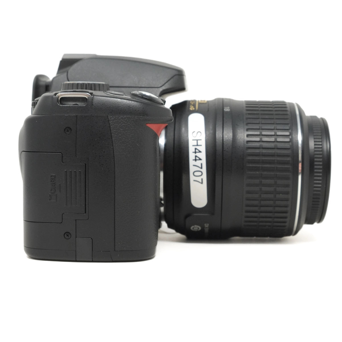 Used Nikon D60 DSLR camera with 18-55mm VR lens - side angle 