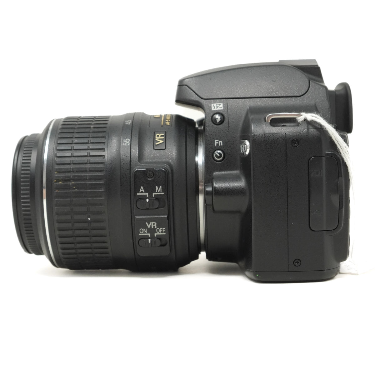Used Nikon D60 DSLR camera with 18-55mm VR lens - side angle 