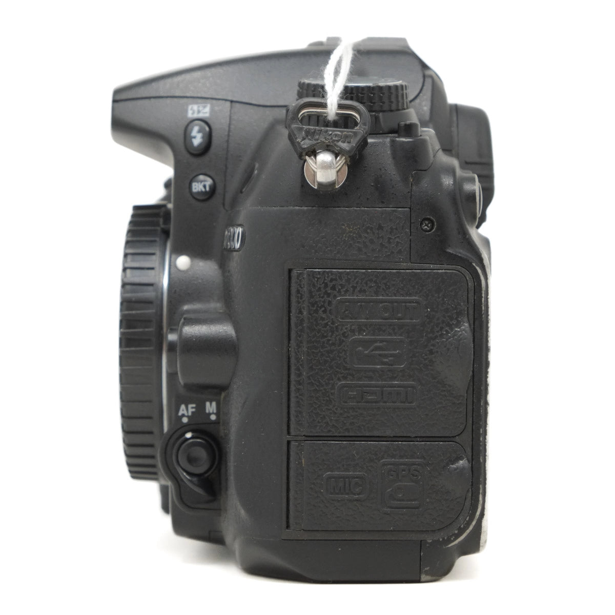Black camera body with control buttons on a white background