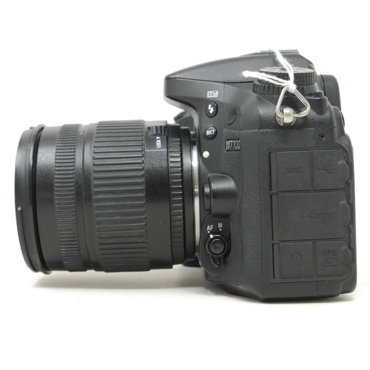 Used Nikon D7100 + Sigma 18-125mm F3.5-5.6 lens - side angle 