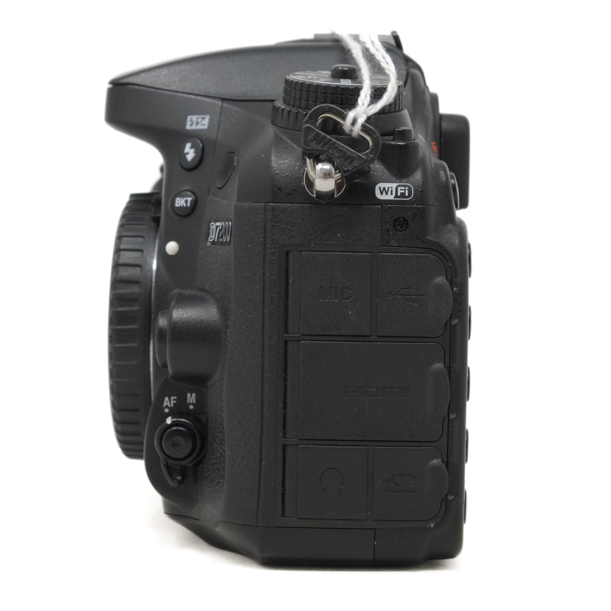 Black camera body with control buttons on a white background