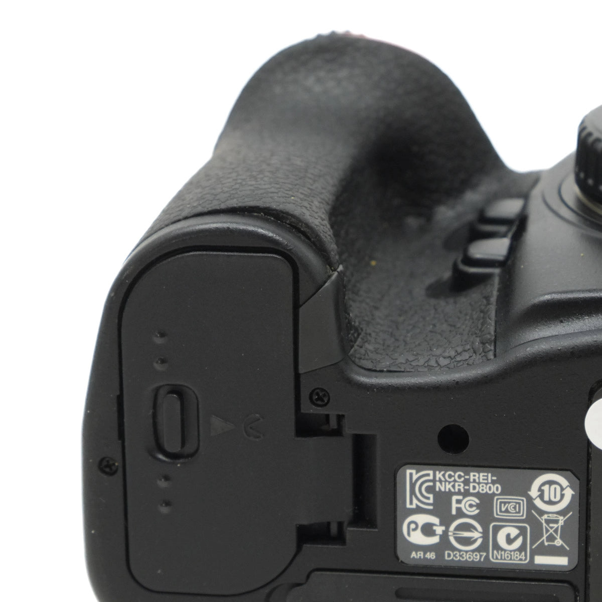Close-up of a camera's grip on a white background