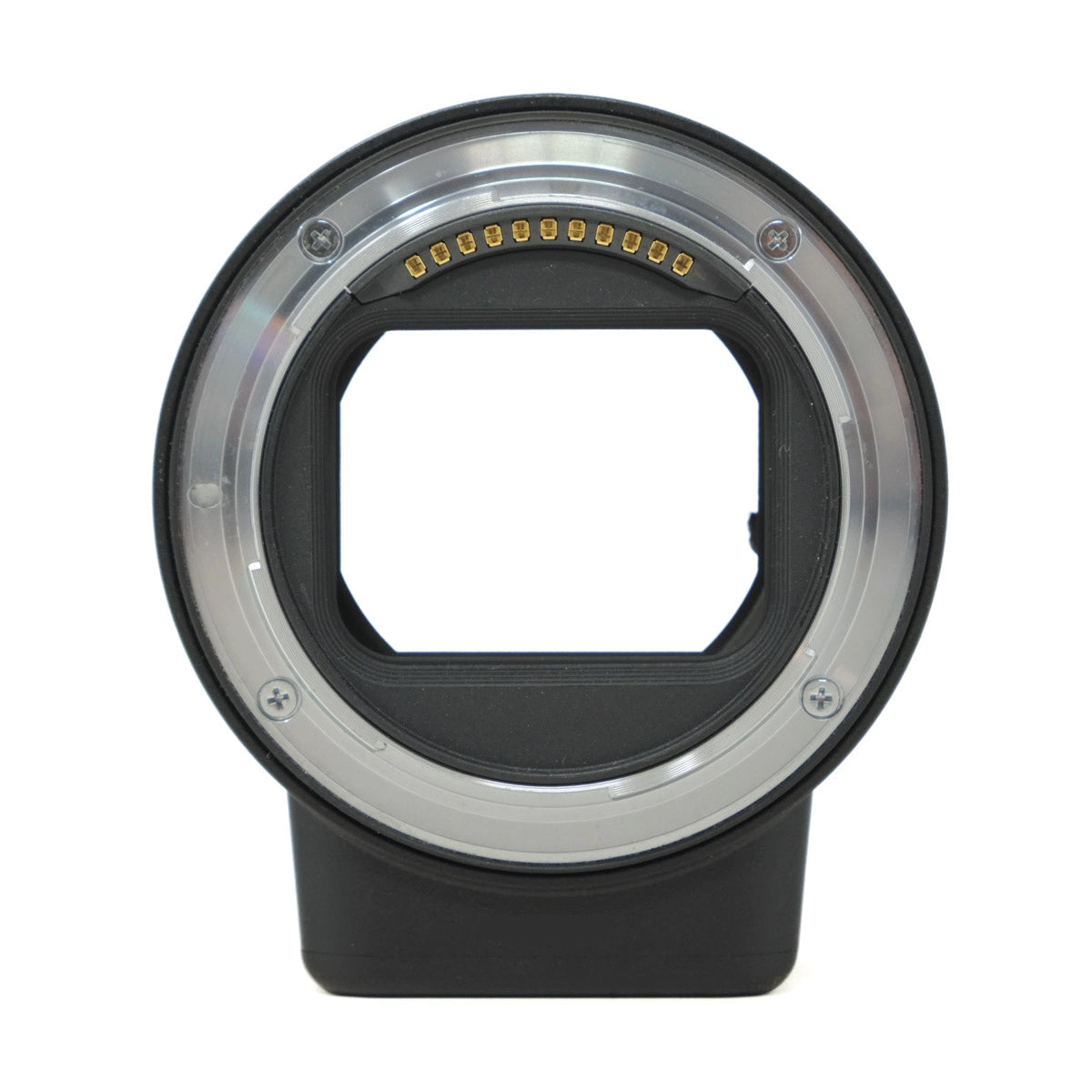 Camera lens mount adapter on a white background