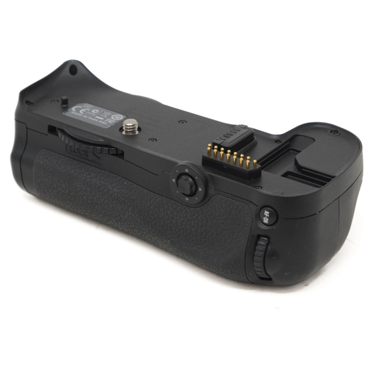 Black camera battery grip on a white background