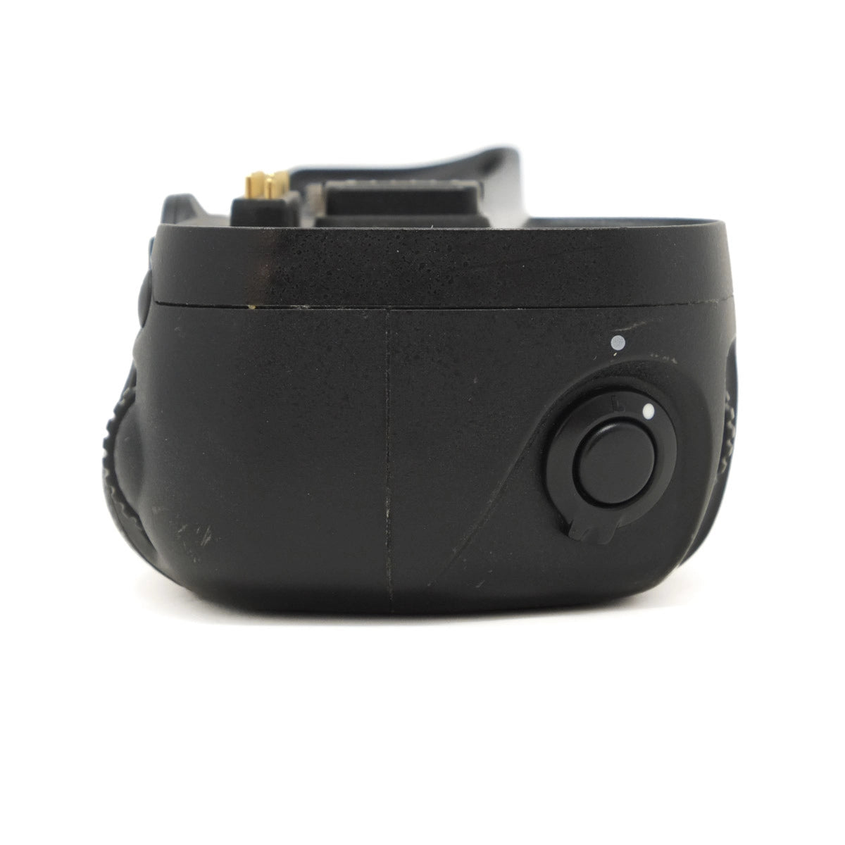 Black camera battery grip on a white background