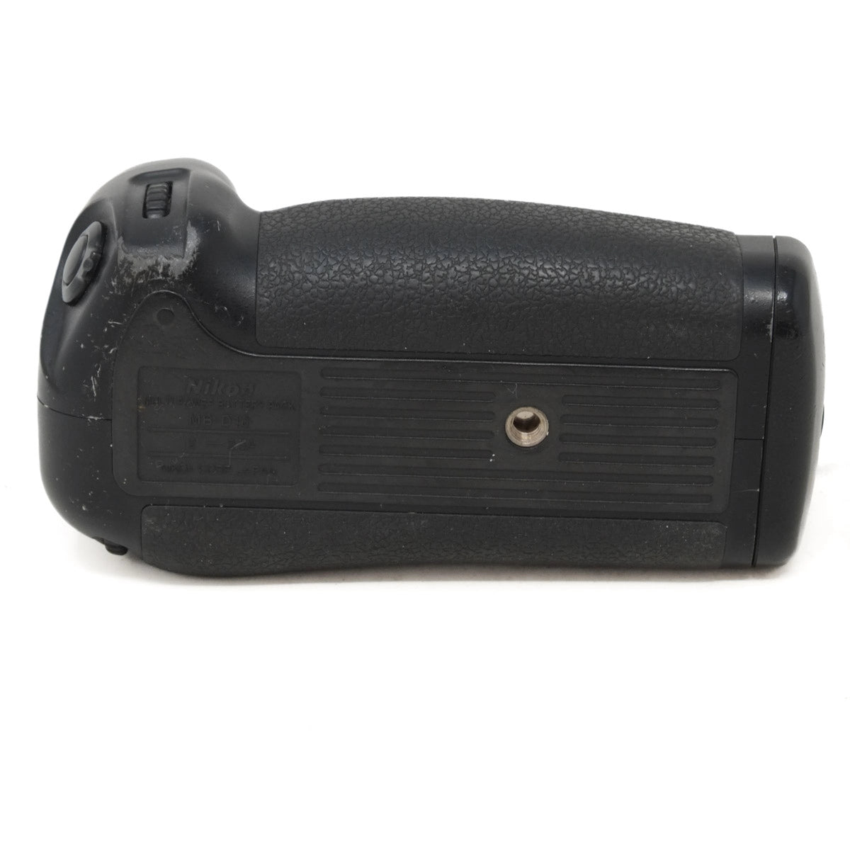 Black camera battery grip on a white background