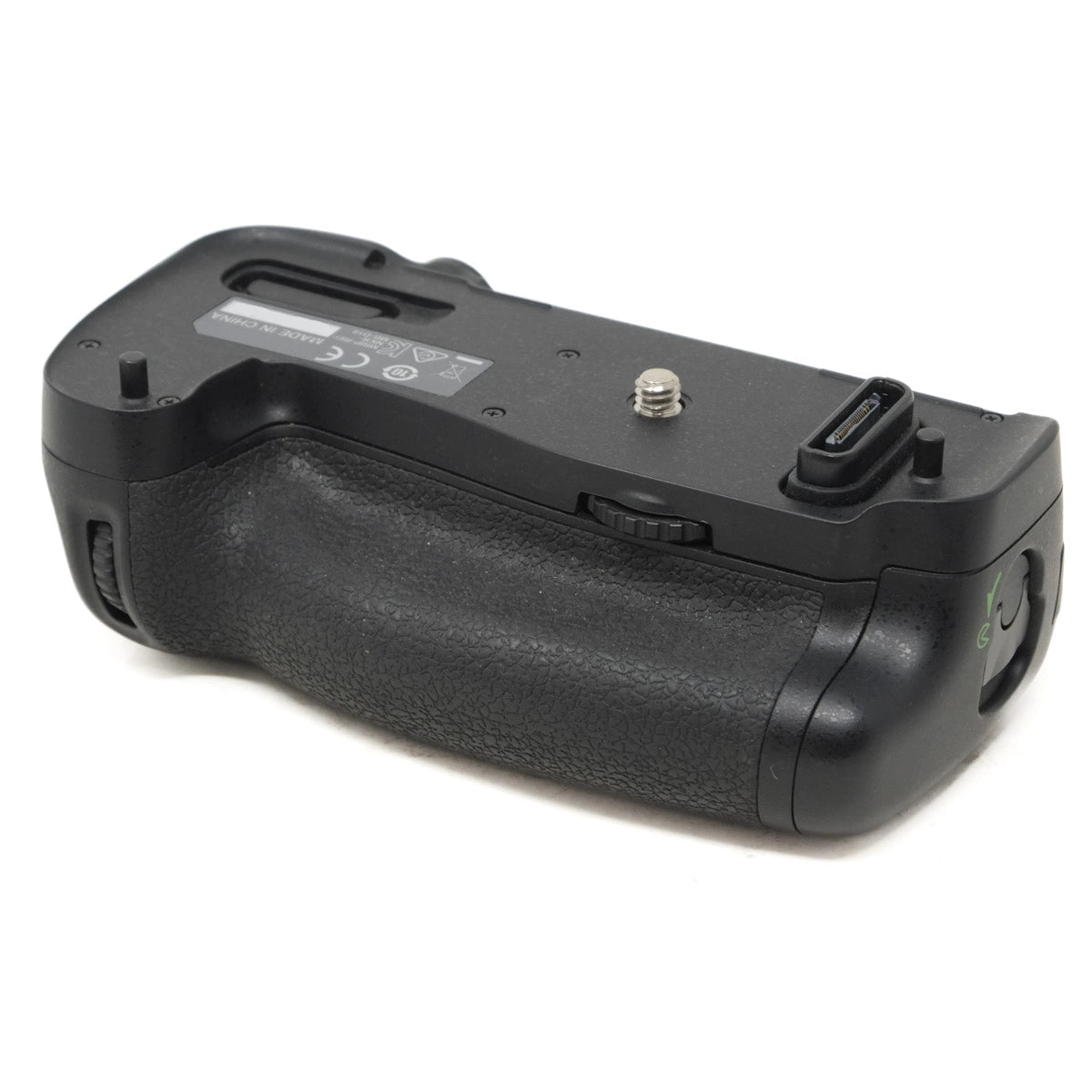 Black camera battery grip on a white background