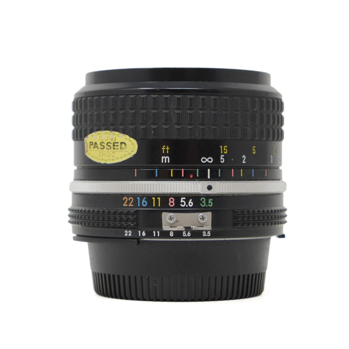 Camera lens with focus scale and aperture information on a white background