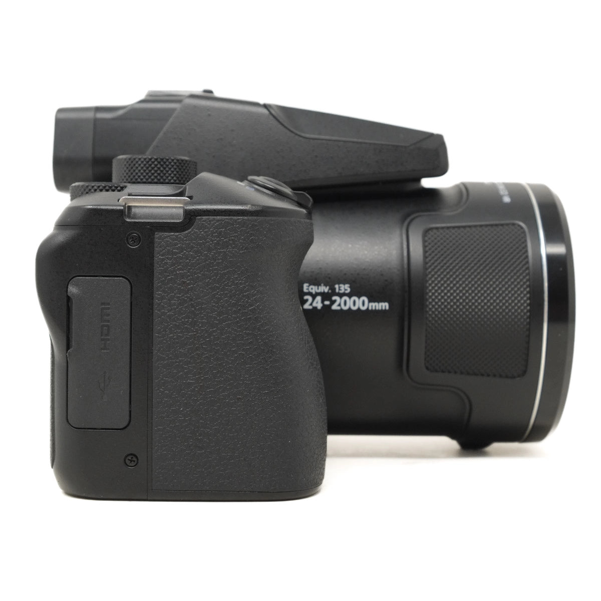 Black digital camera with lens on a white background