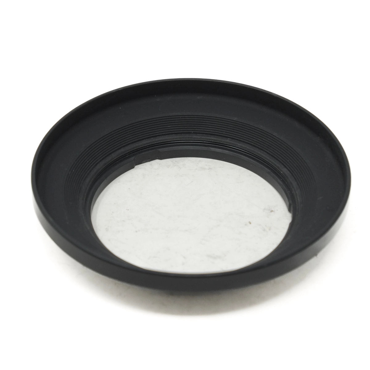 Black camera lens hood on a white background