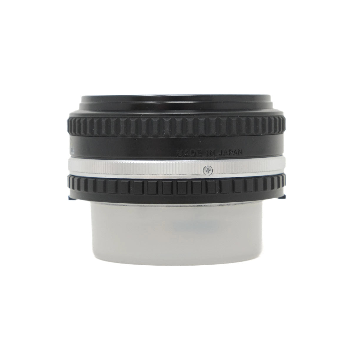 Camera lens with black and silver design on a white background