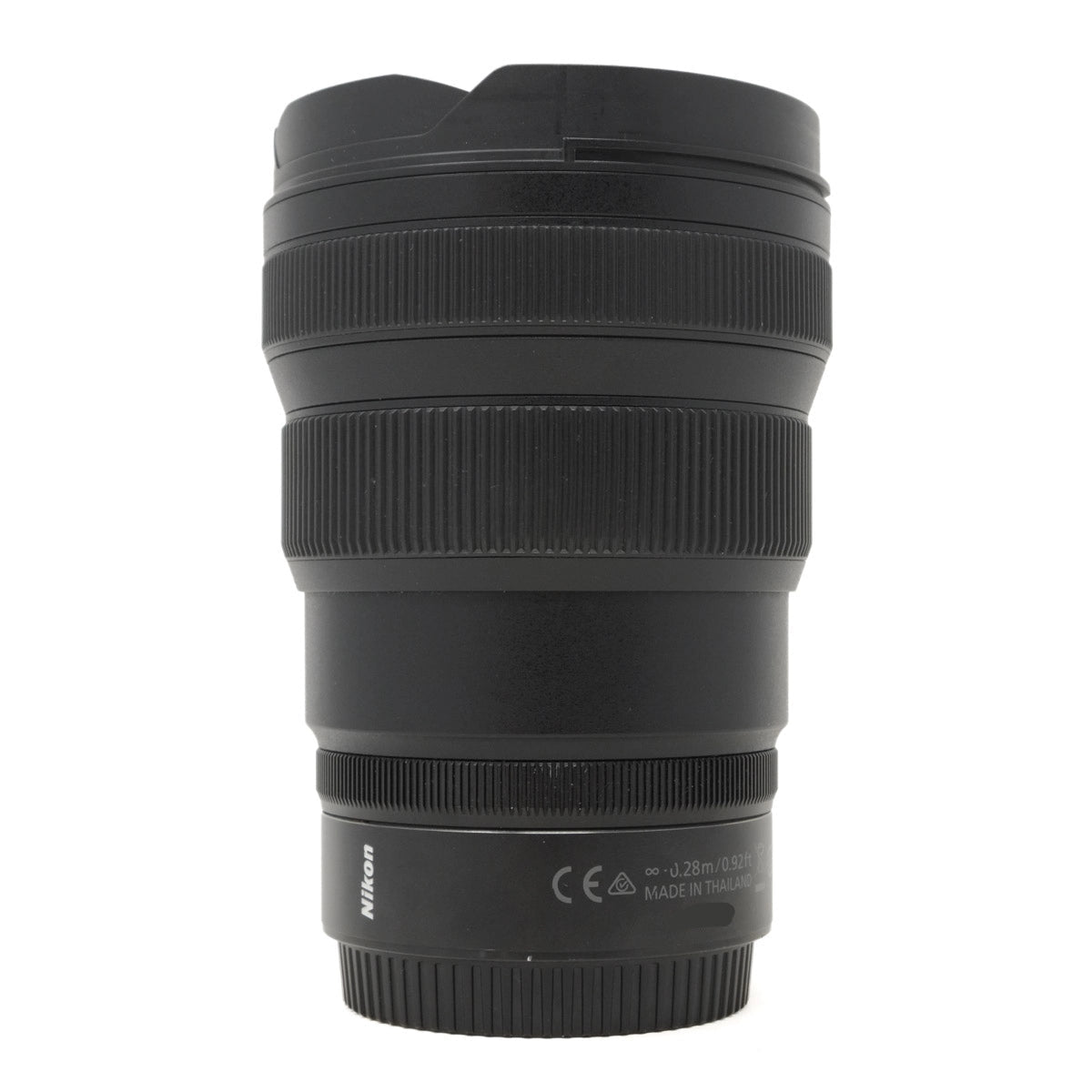 Black camera lens with Nikon branding on a white background