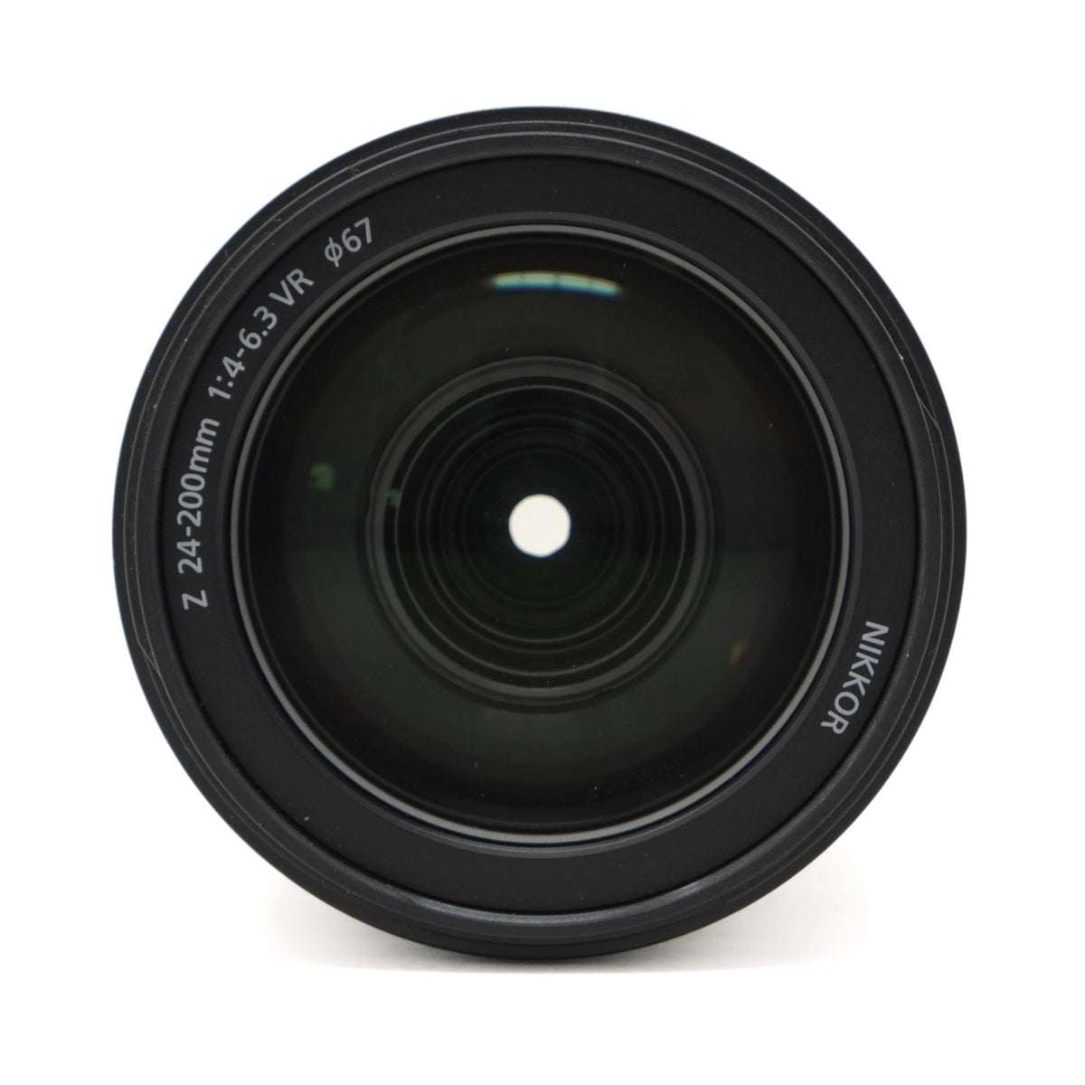 Camera lens with Nikon branding on a white background