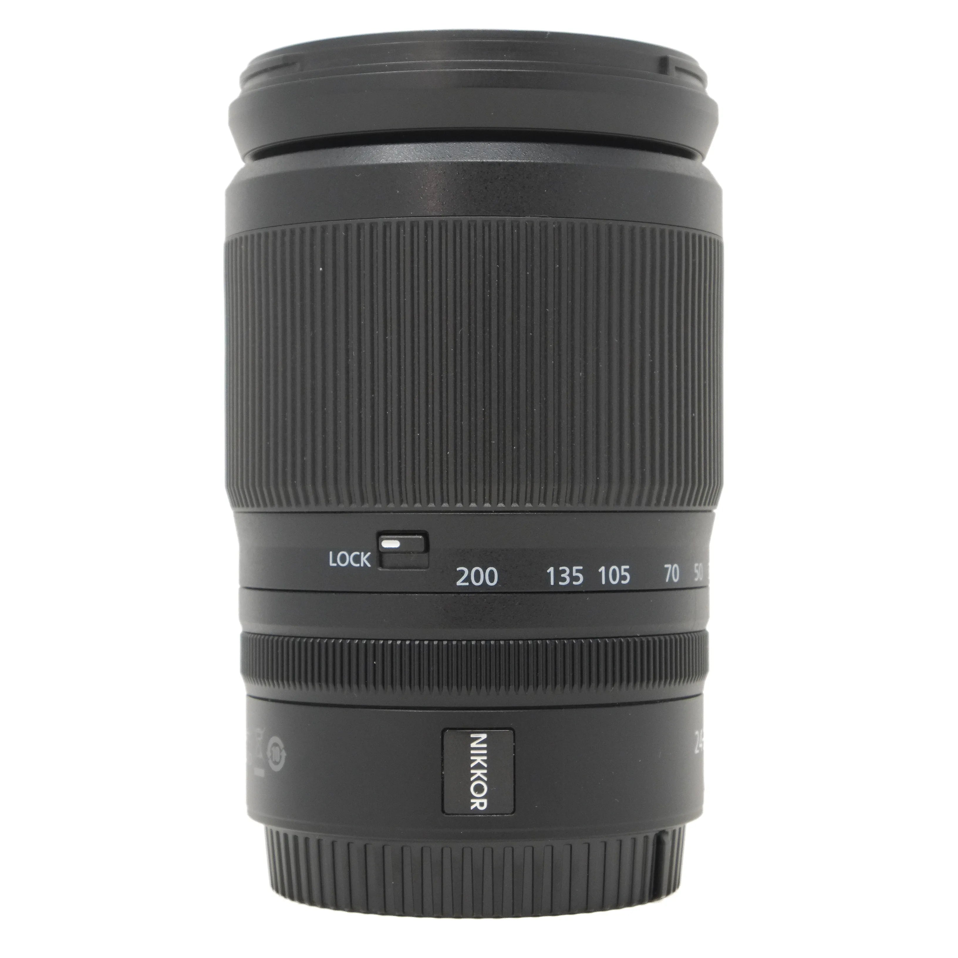 Black camera lens with 'Nikkor' branding on a white background