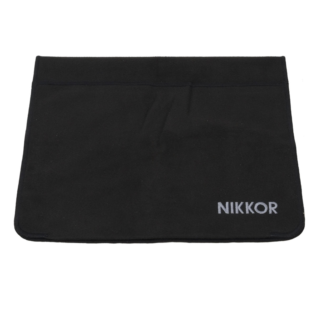 Black cloth with 'Nikkor' branding on a white background