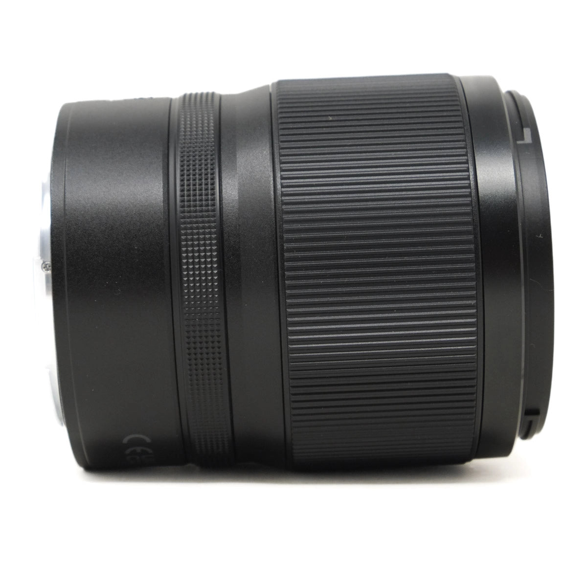 Black camera lens on a white background