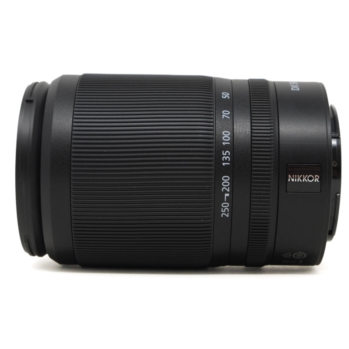 Camera lens with Nikkor branding on a white background