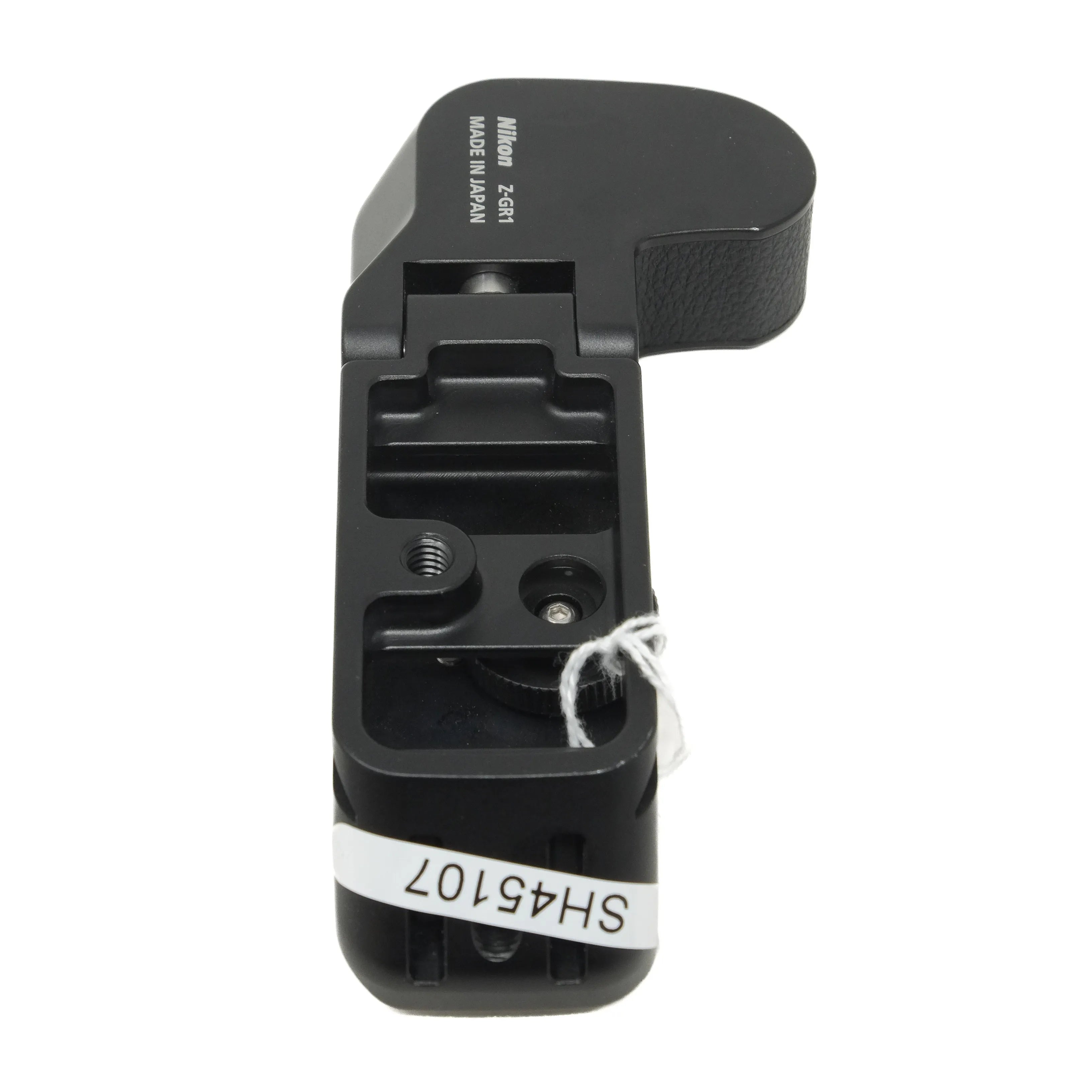 Black camera accessory with 'Made in Japan' text on a white background