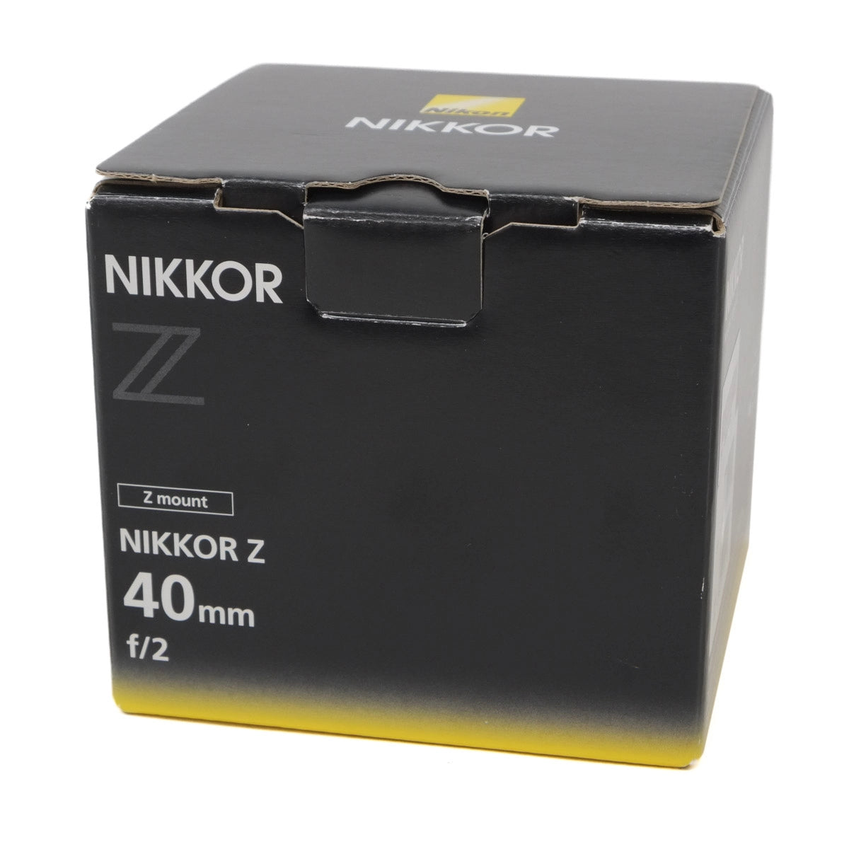 Nikkor camera lens packaging box on a white background