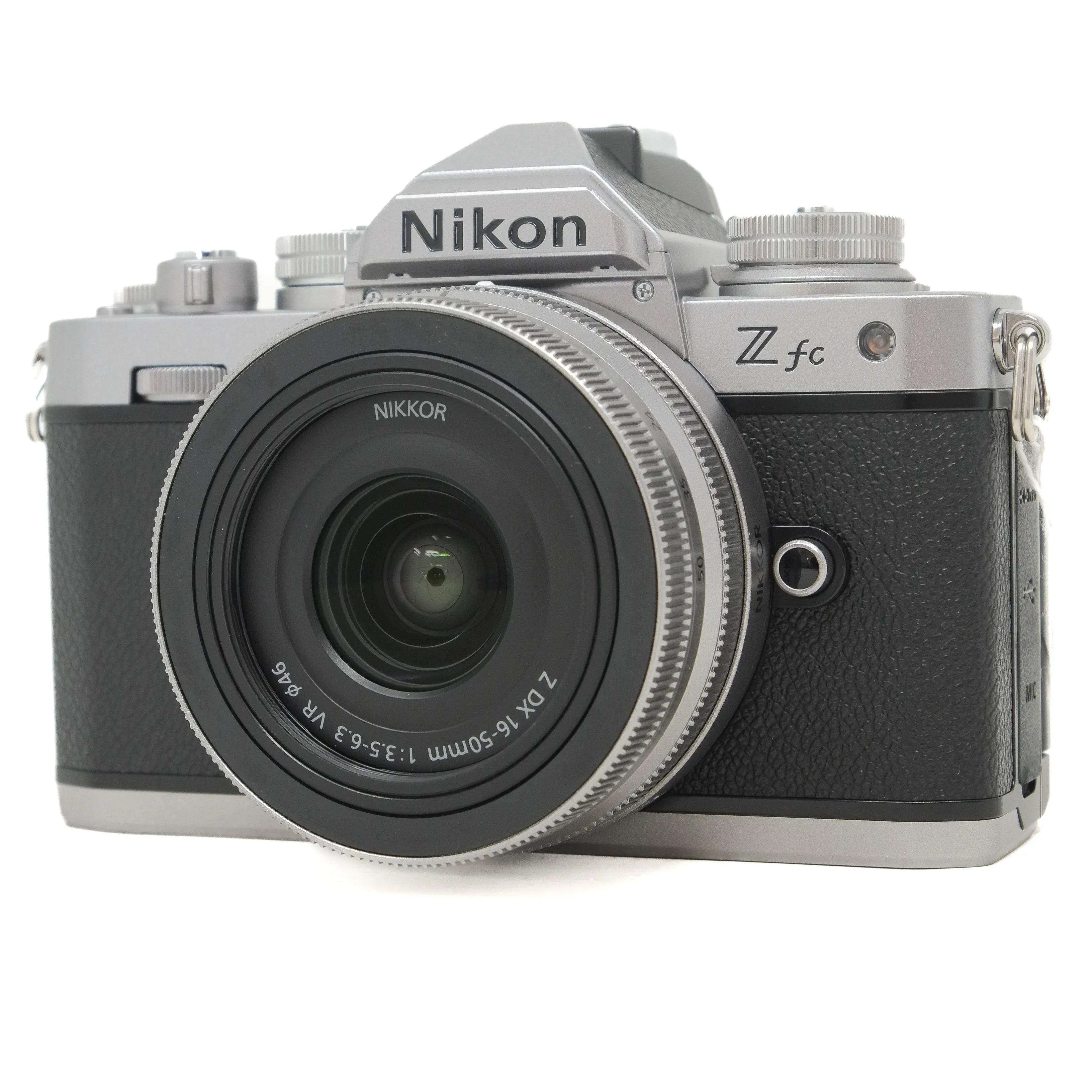 Nikon Z fc camera with Nikkor lens on a white background