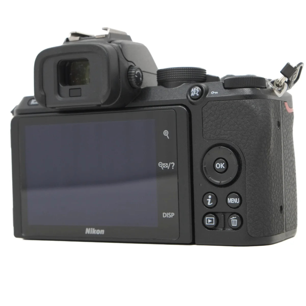 A black Nikon mirrorless camera with an attached viewfinder and a large rear LCD screen, shown from the back against a plain white background.