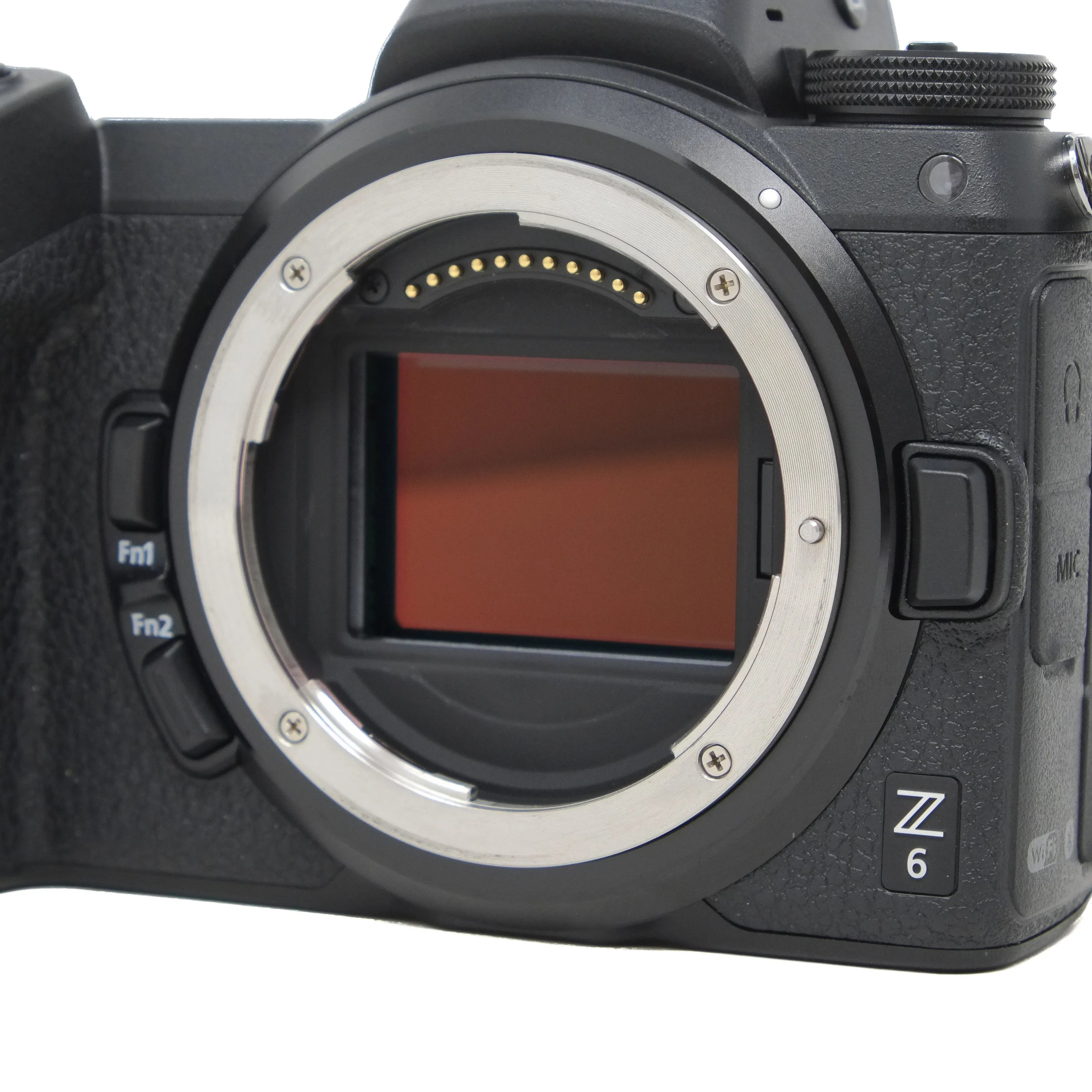 Camera body without lens on a white background