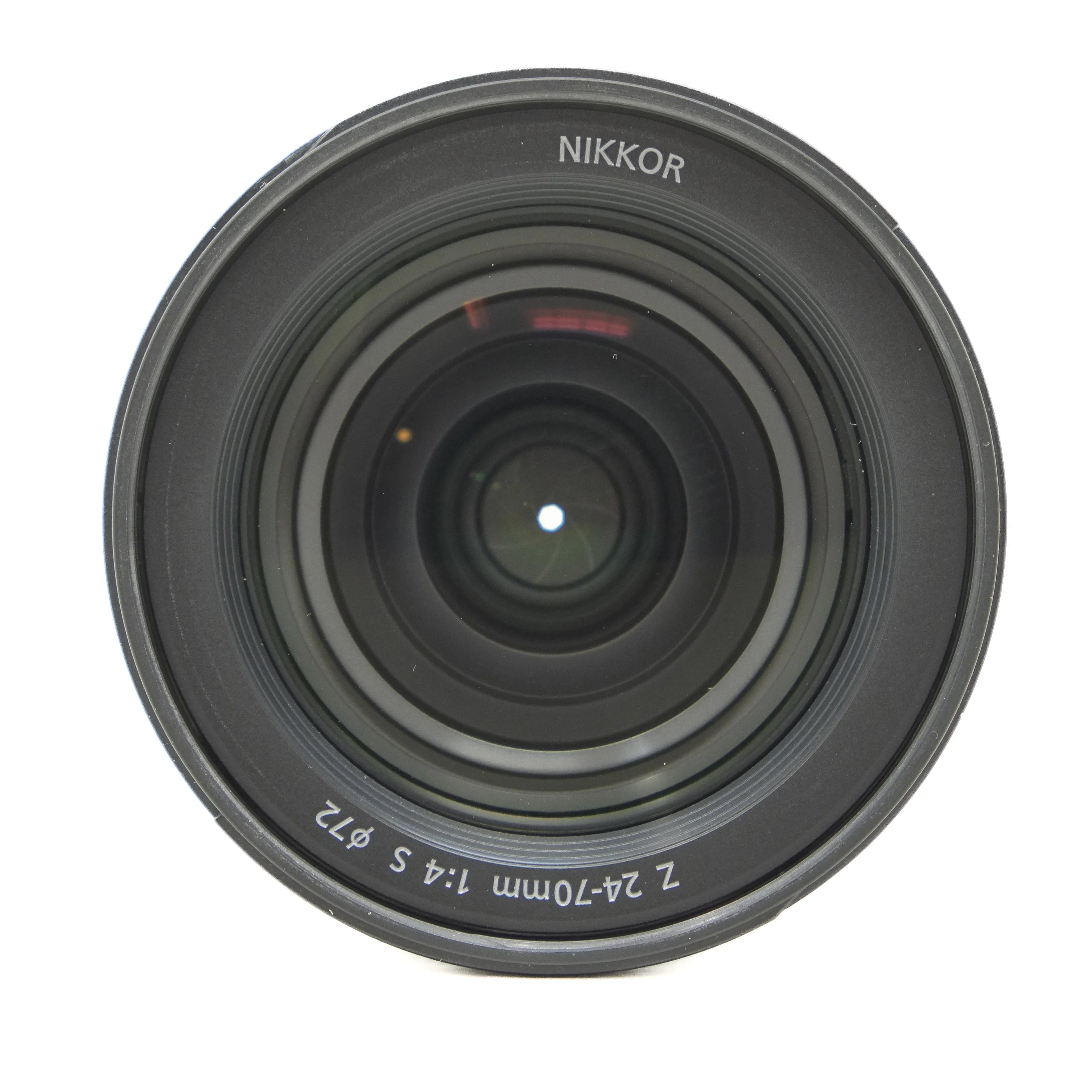 Camera lens with 'Nikkor' branding on a white background