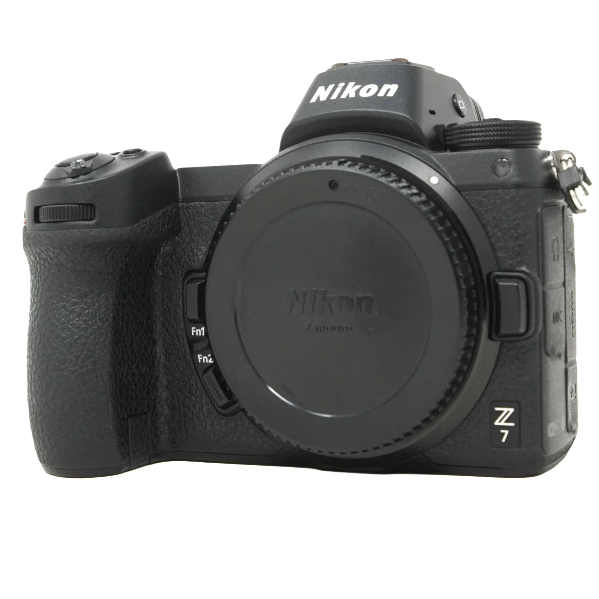 Nikon Z 7 mirrorless camera body in black, shown from the front with the lens cap removed and a blank lens attached, on a white background.