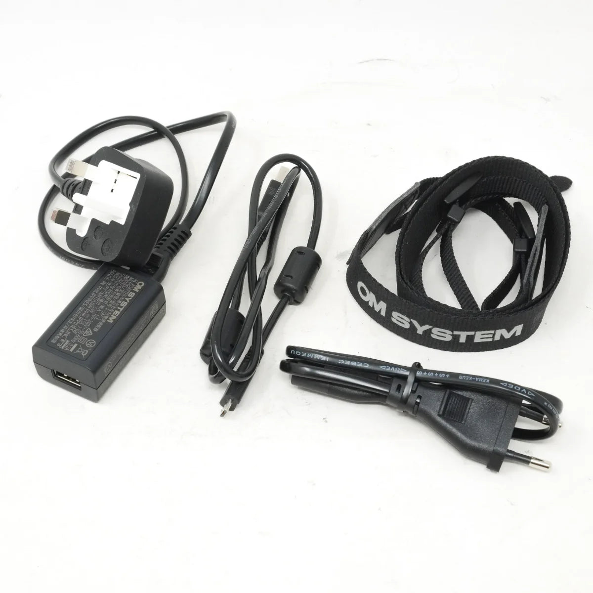 Used OM System OM-5 Mirrorless camera - charger and strap