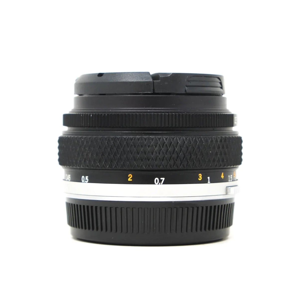 Used Olympus Auto-S 50mm f1.8 prime lens = side angle