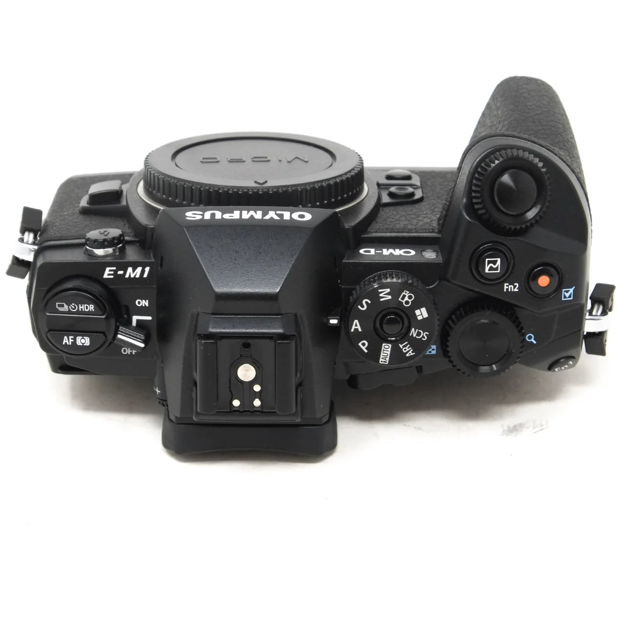 Used Olympus E-M1 Mirrorless camera with Spare OM Battery - top angle 