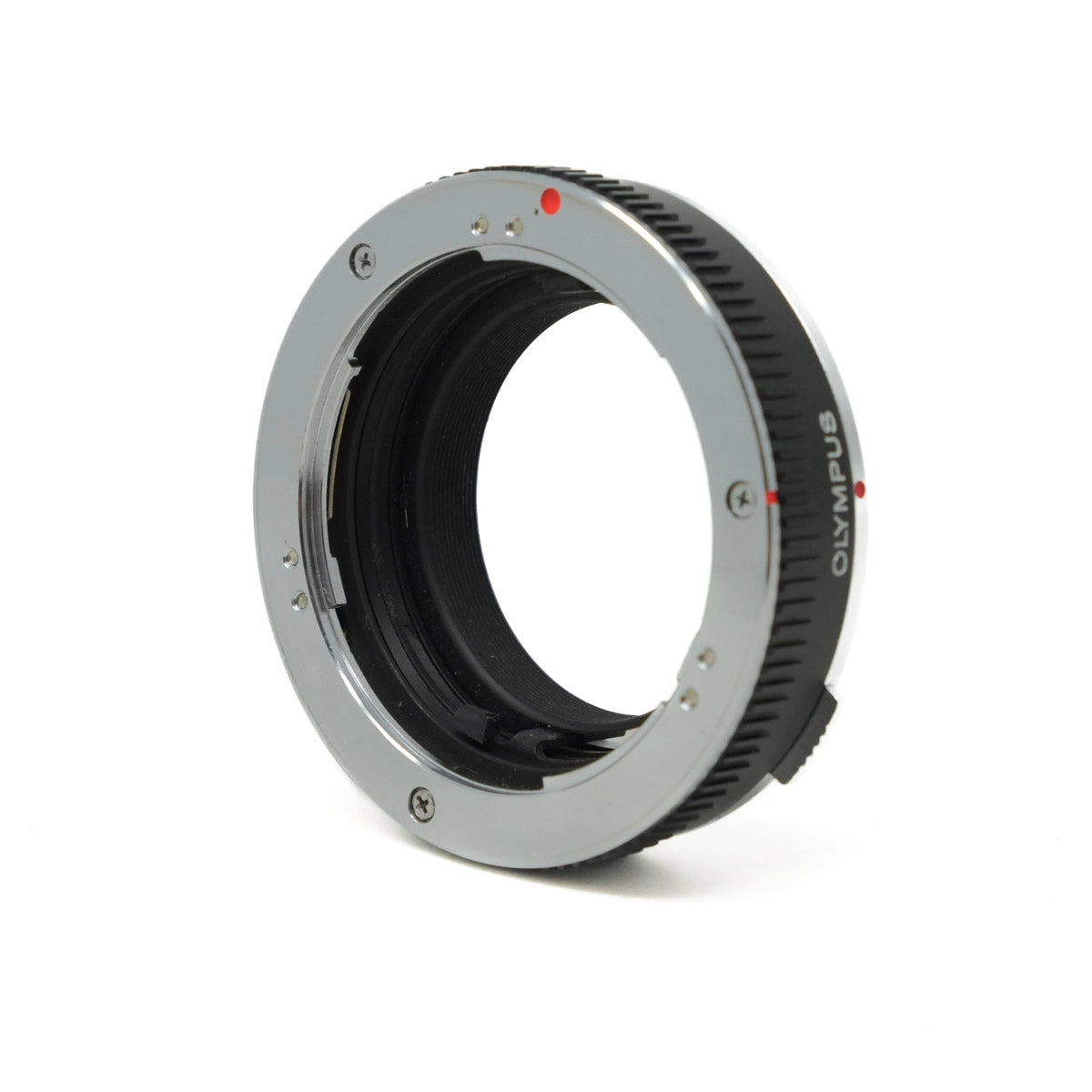 Camera lens extension tube with Olympus branding on a white background