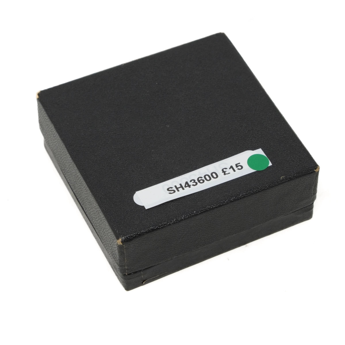 Black rectangular box with a label on a white background