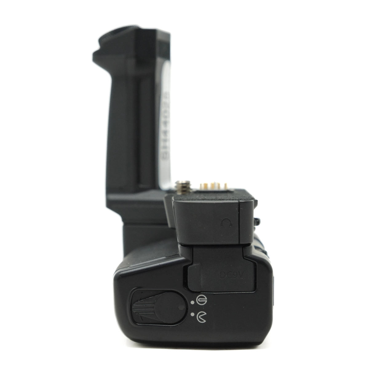 Black camera battery grip on a white background