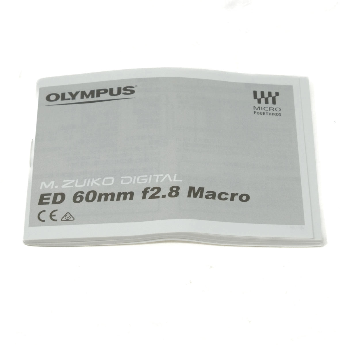Olympus M.Zuiko Digital ED 60mm f2.8 Macro lens instructions on a white background