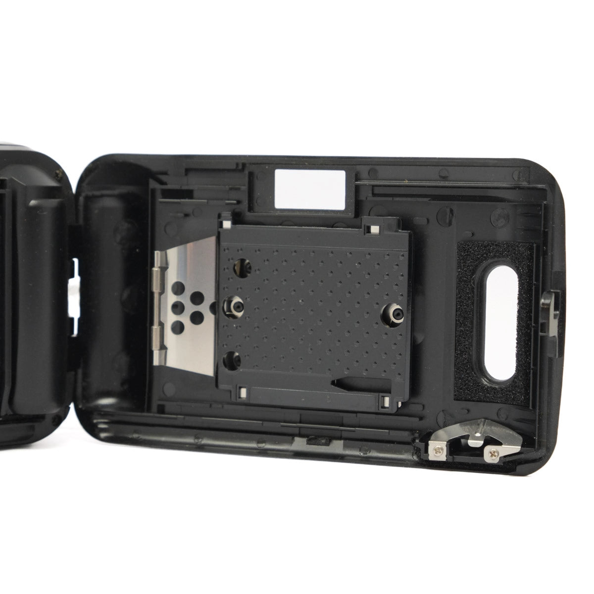 Black electronic device casing with internal components on a white background