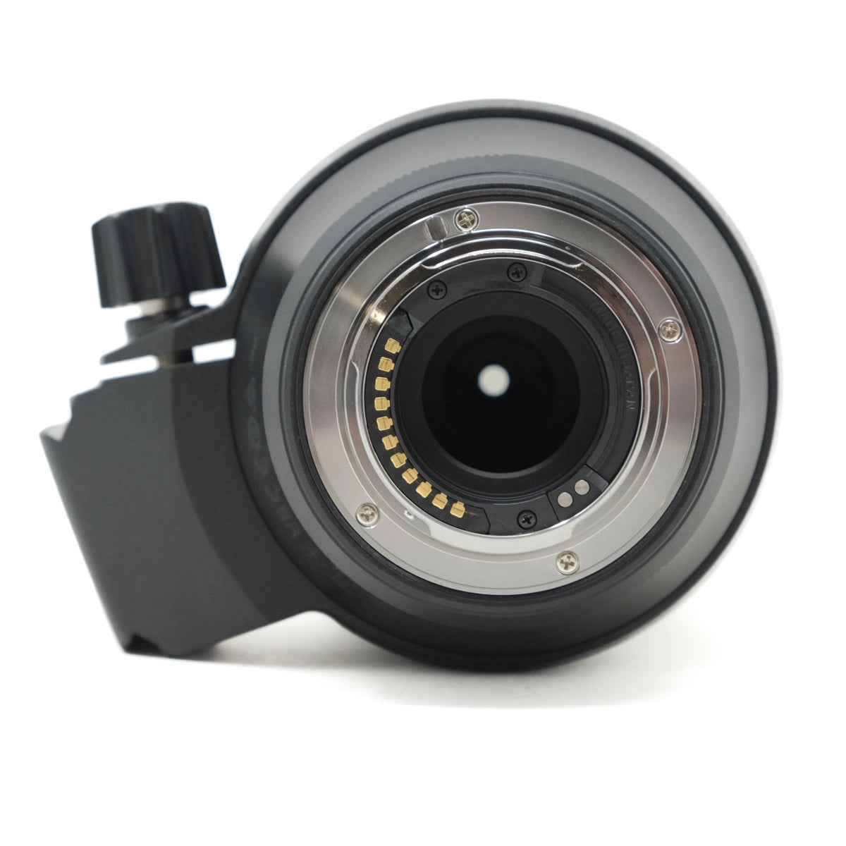 Camera lens with focus ring on a white background