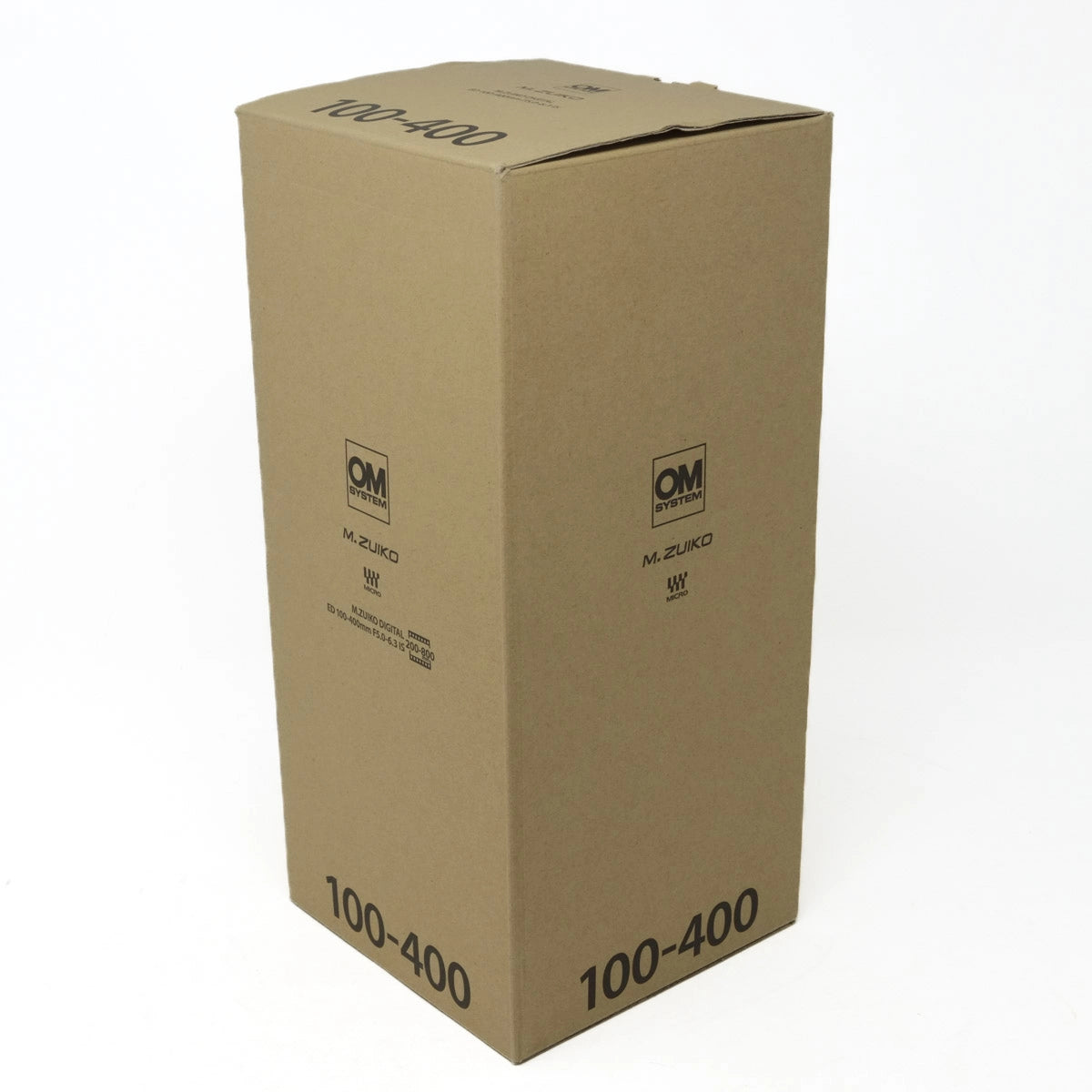 Cardboard box with 'OM' branding and product code on a white background