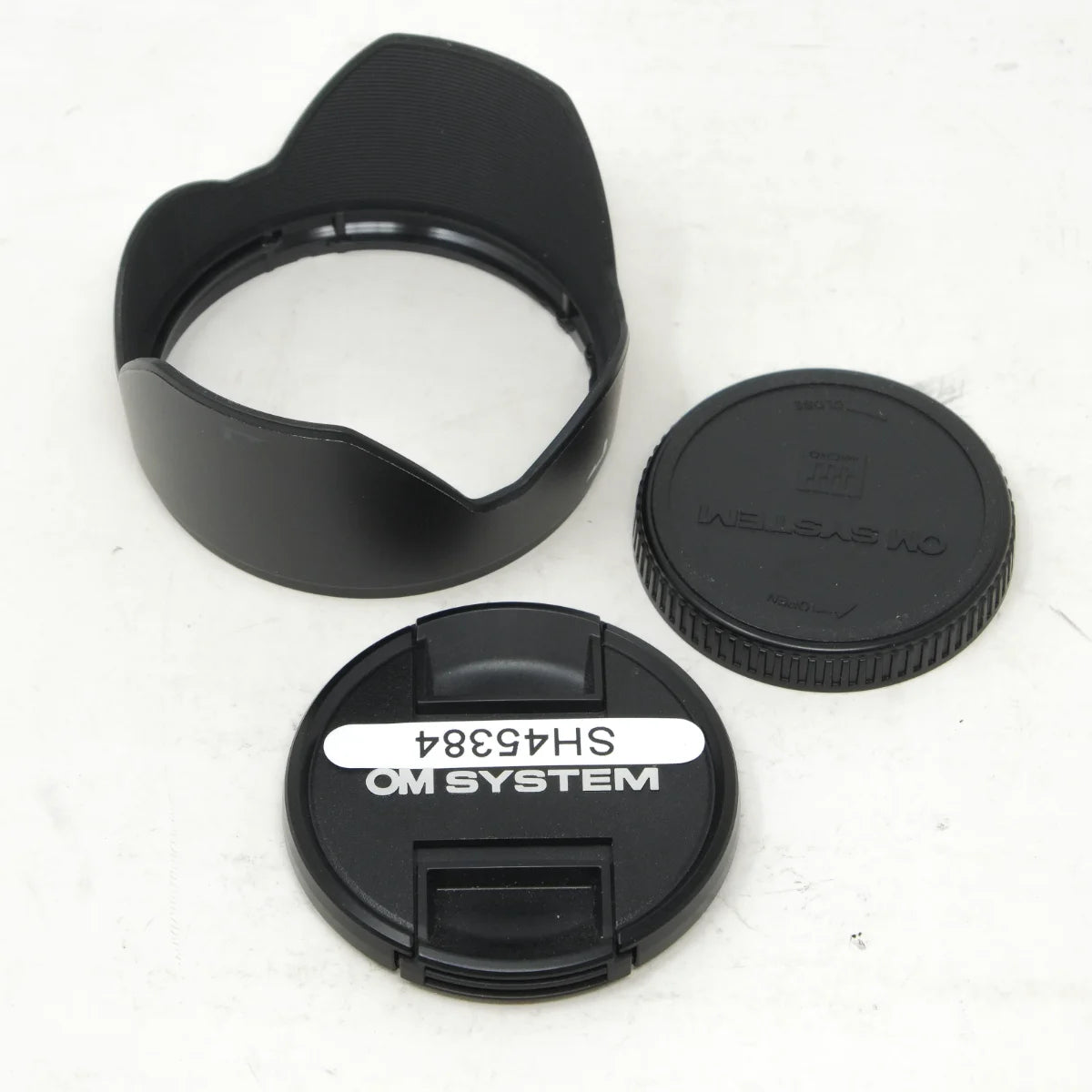 Used Olympus OM System 12-45mm F4 PRO ED Lens MFT - lens hood and caps 