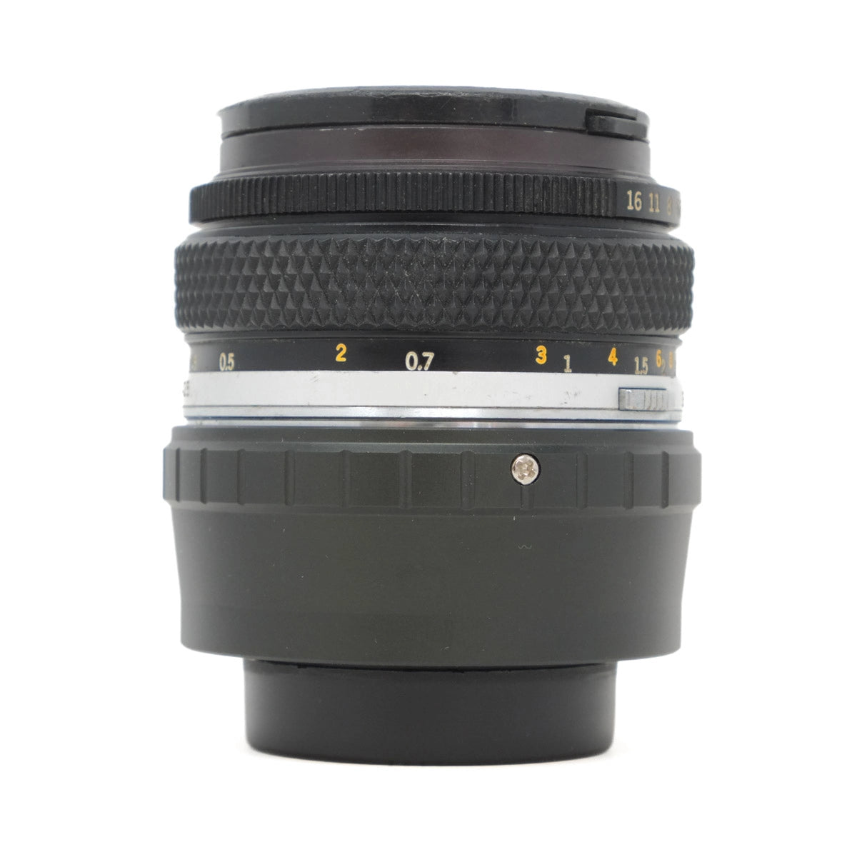 Camera lens with focus scale on a white background