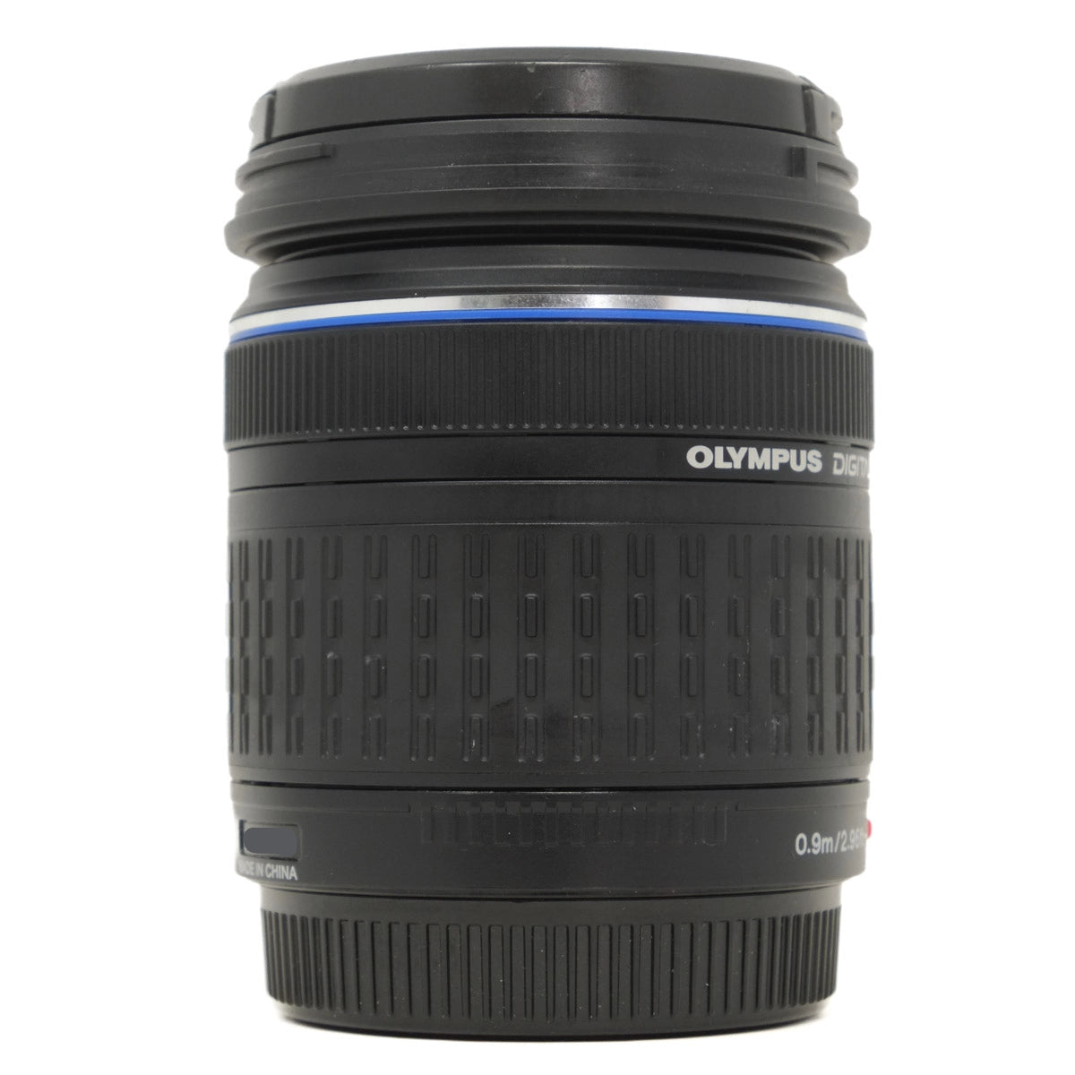 Black Olympus camera lens on a white background