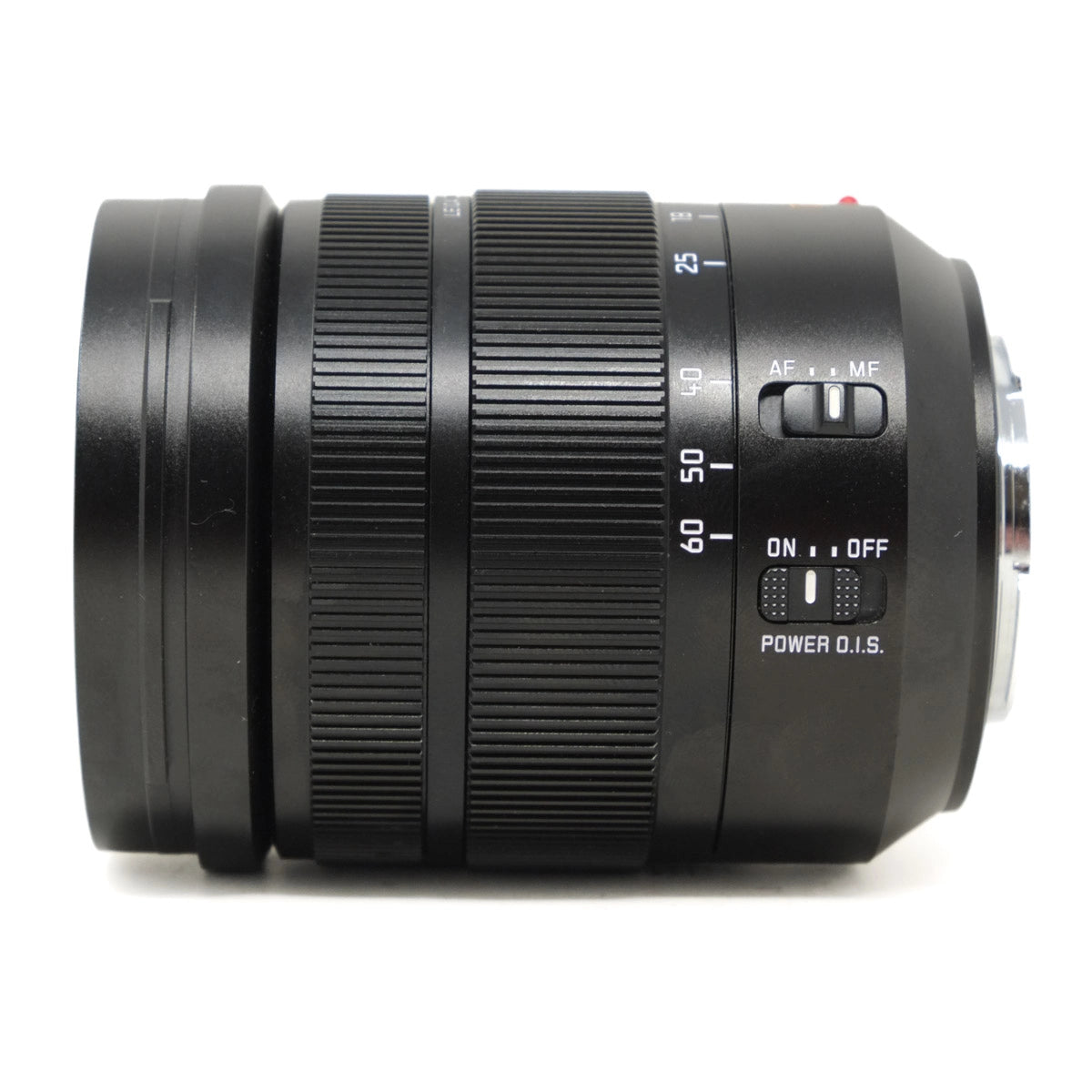 Black camera lens with control buttons on a white background